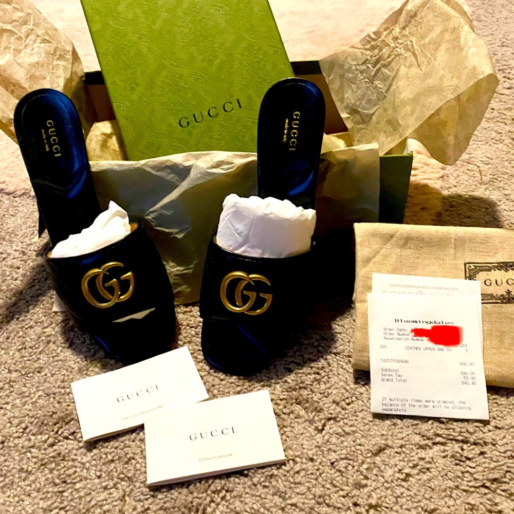 Authentic Gucci size 7 Black quilted double GG heel slides.